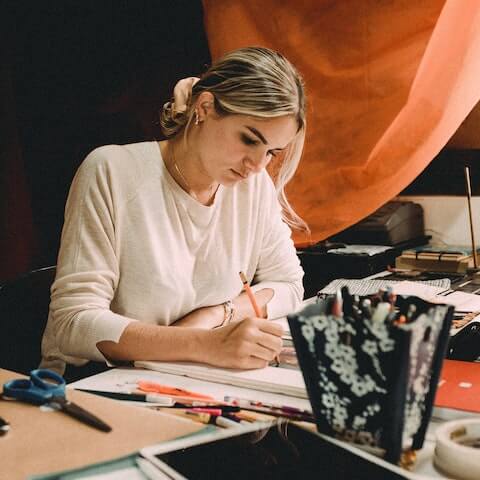 Graphic designer accessing her creative mind at work