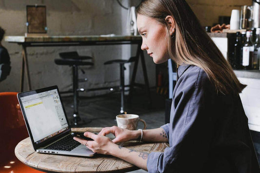 Creative lady working in coffee shop