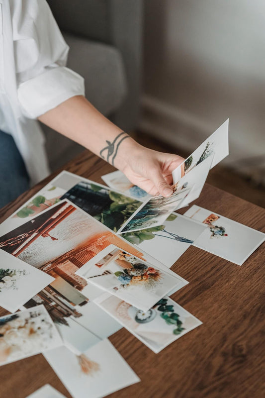 Lady holding affirmation photos