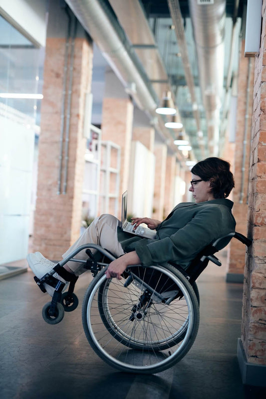 creative entrepreneur in wheelchair organising her work and personal life