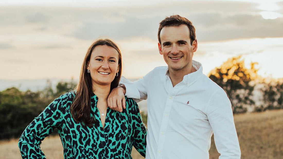 Ollie and Clare, OCCO London's co-founders, together in warm outdoor light