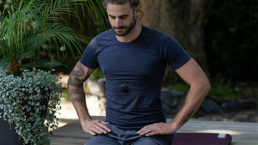 Person in a meditation pose on a yoga mat outdoors, morning pages like morning meditation is a daily practice of clearing the mind before the day begins