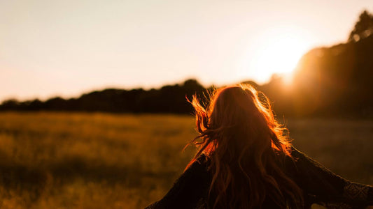 Person in a quiet moment of reflection, practising gratitude affirmations for a positive mindset