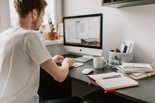 Creative business founder with ADHD working with his journal
