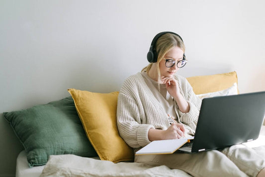Female entrepreneur, thinking of creative things to write in her journal