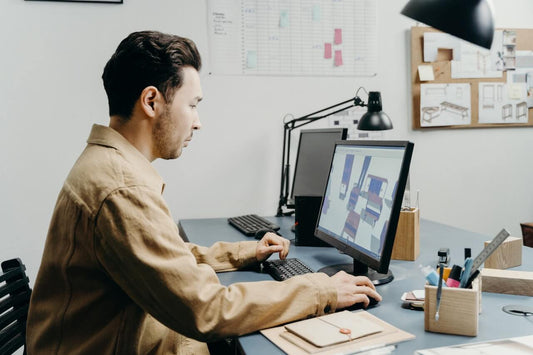 Multi passionate furniture designer working at his desk
