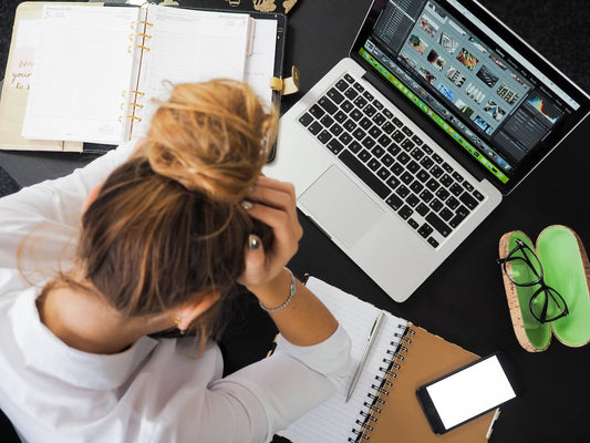 creative lady stressed with toxic productivity