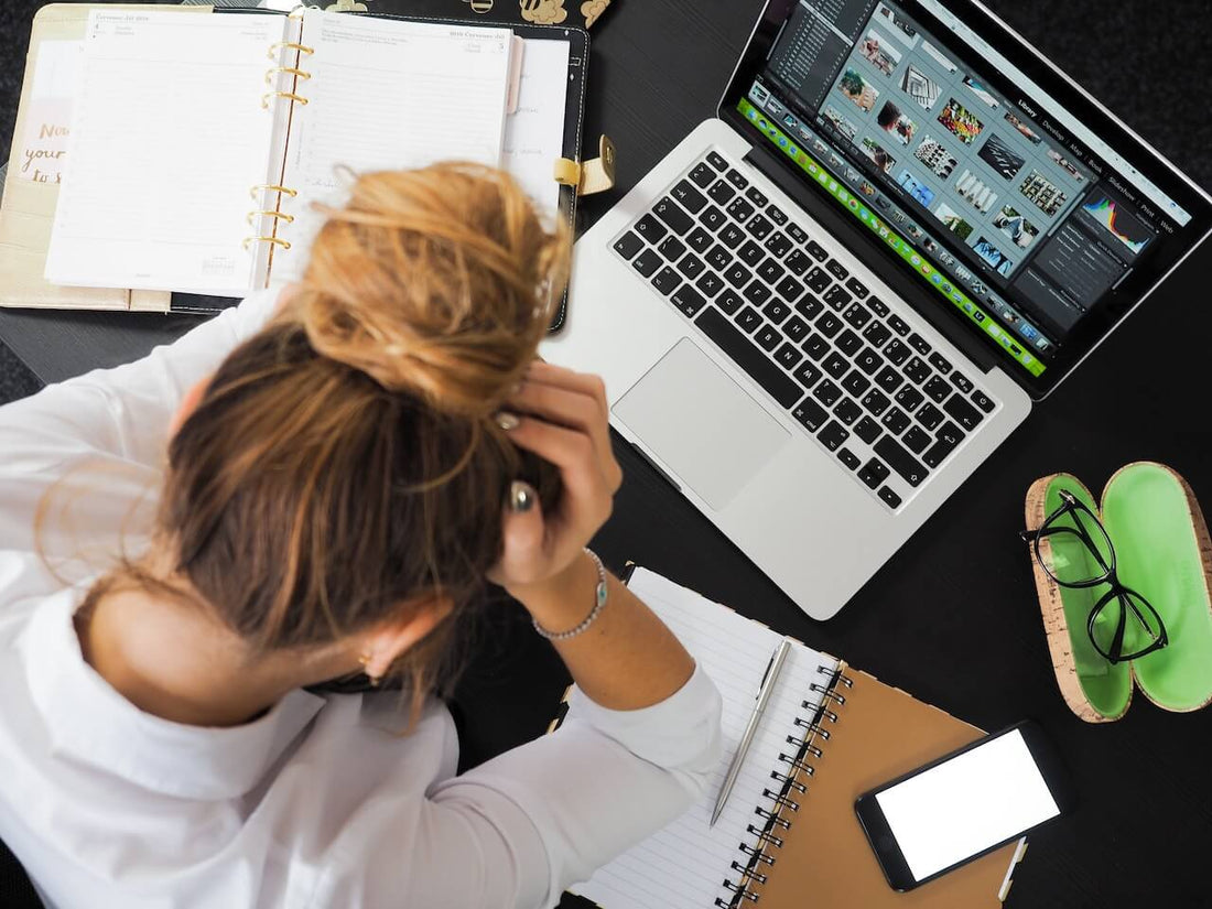 creative lady stressed with toxic productivity