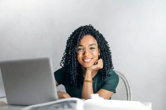 creative lady working at her desk having a productive day