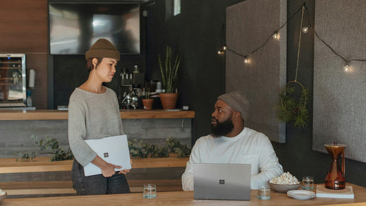 Person reviewing their finances calmly at a desk with a planner open
