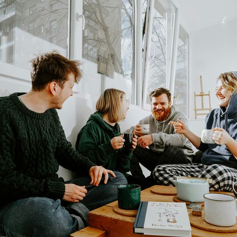 Person resting in a calm, quiet space — the environment that supports autistic burnout recovery